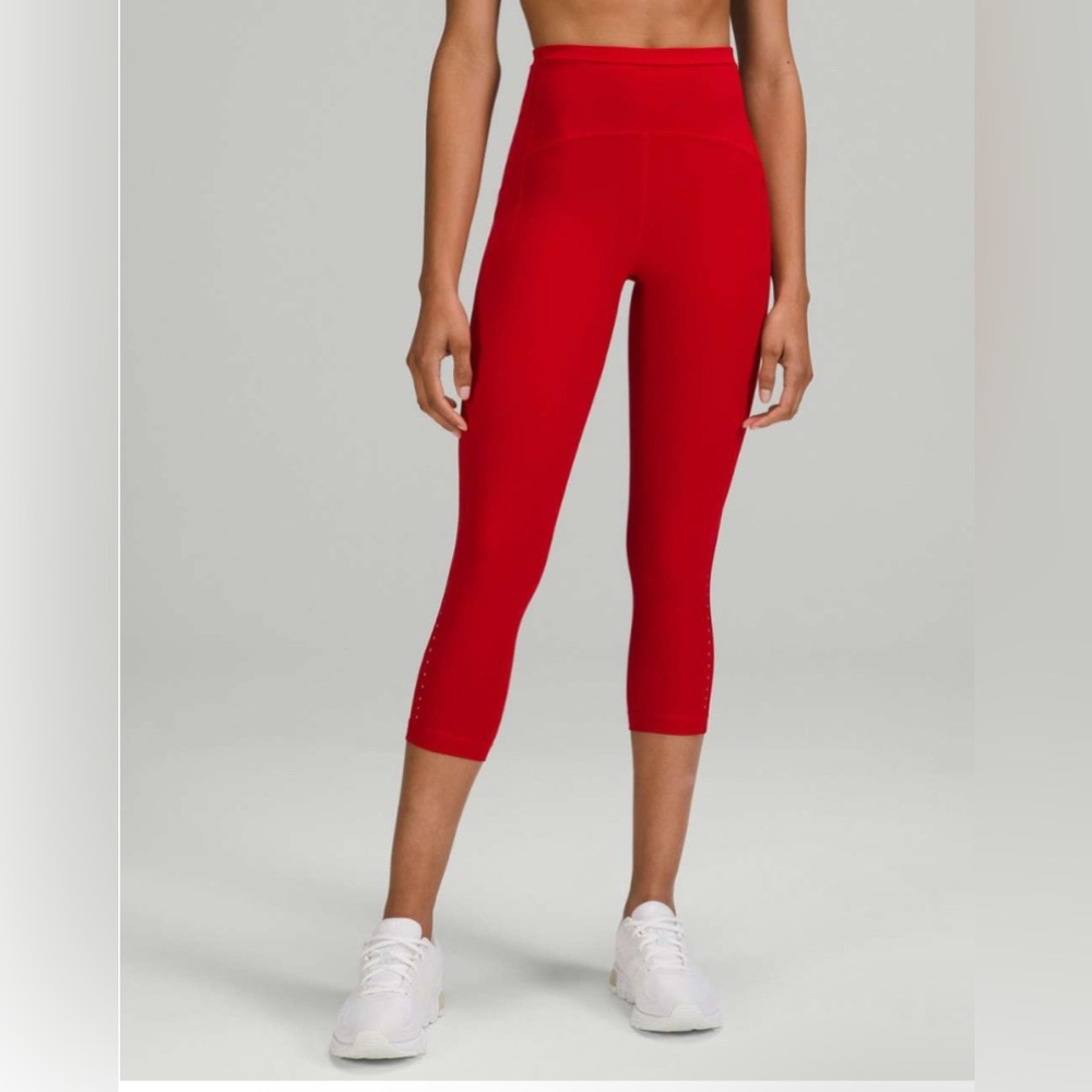 Lululemon Swift Speed High-Rise Crop 21"
Dark Red size 16